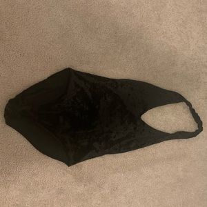 Velvet black bodysuit with back cut out.